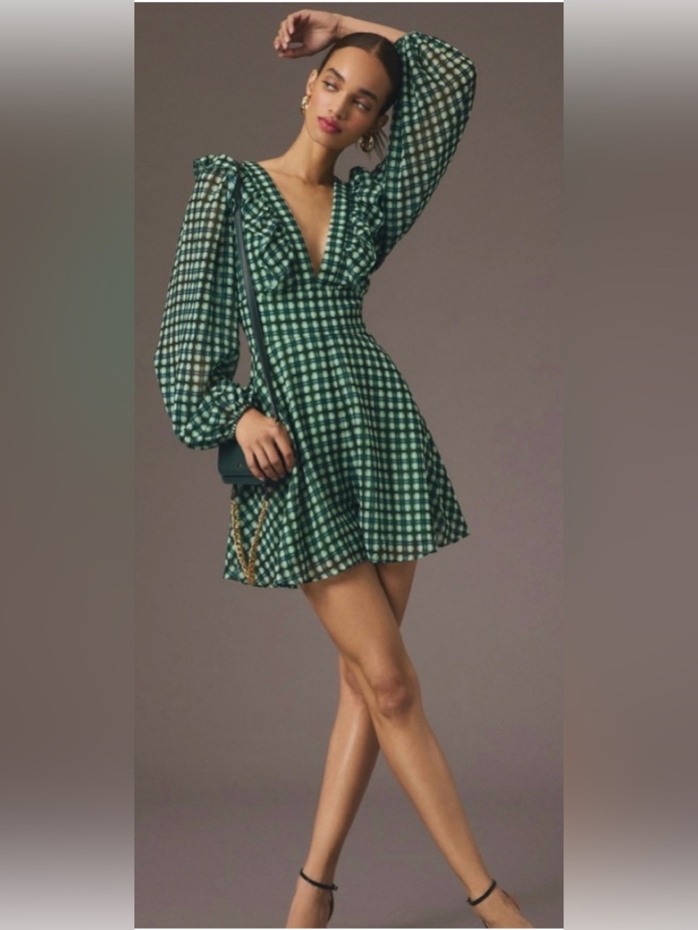Anthropologie Hutch long-sleeve romper features a deep V-neckline